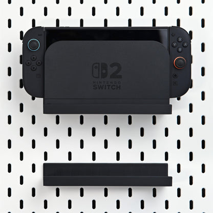 The Nexus for Nintendo Switch 2- Pegboard Organizer System, Featuring a Dock Shelf, Game Case Rack, and Controller Stand.