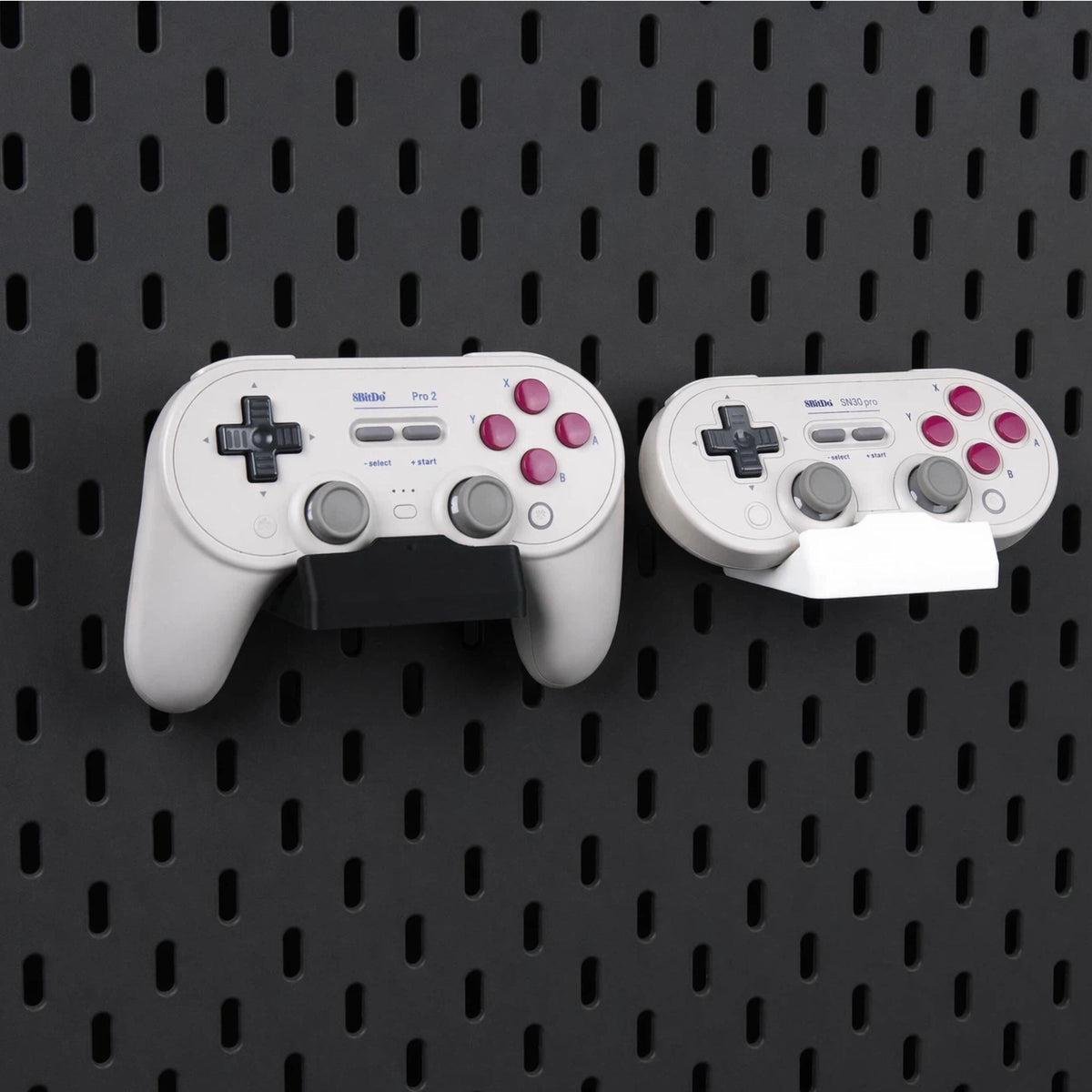 Pegboard Controller Holder for 8BitDo Pro 2, Pro 3 & SN30 Pro displayed on a compatible pegboard