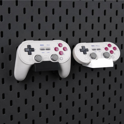Pegboard Controller Holder for 8BitDo Pro 2, Pro 3 & SN30 Pro displayed on a compatible pegboard