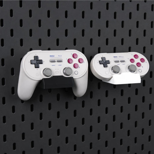 Pegboard Controller Holder for 8BitDo Pro 2, Pro 3 & SN30 Pro displayed on a compatible pegboard