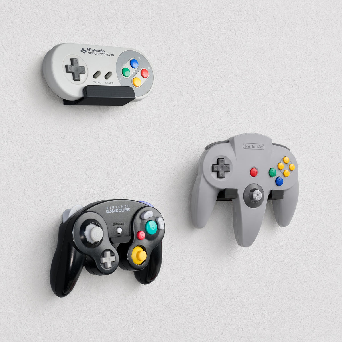 Wall-Mounted Holders for N64, SNES & GameCube Controllers – product image 1